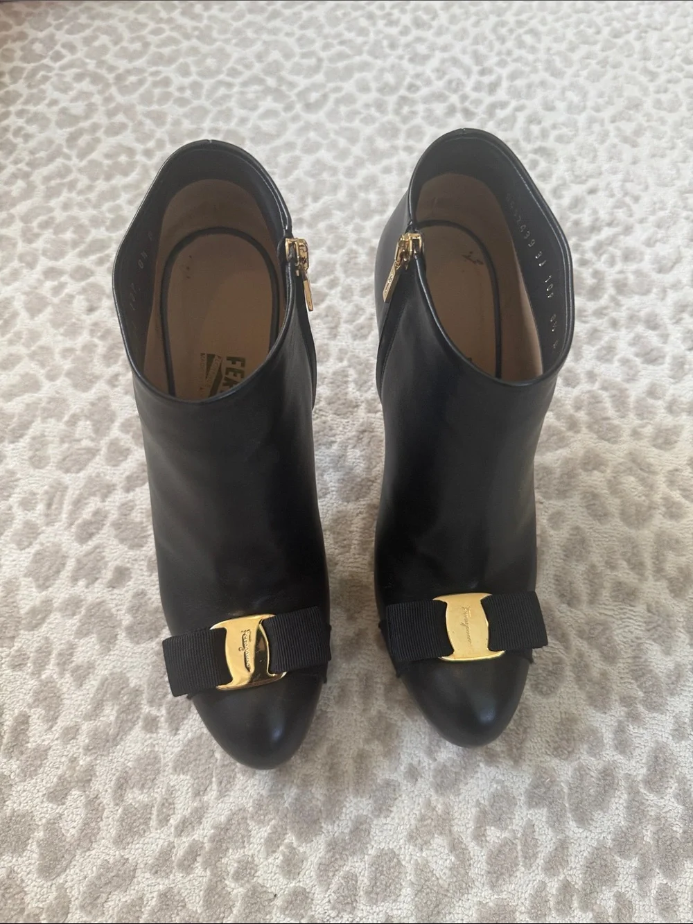 Salvatore Ferragamo Black Leather Ankle Booties with Gold Bow Plaque